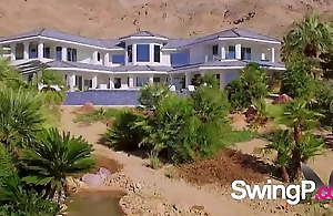 Swinger couple makes an exciting looks to the swing house