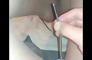 Caged cissy in nylons sounding her clitty